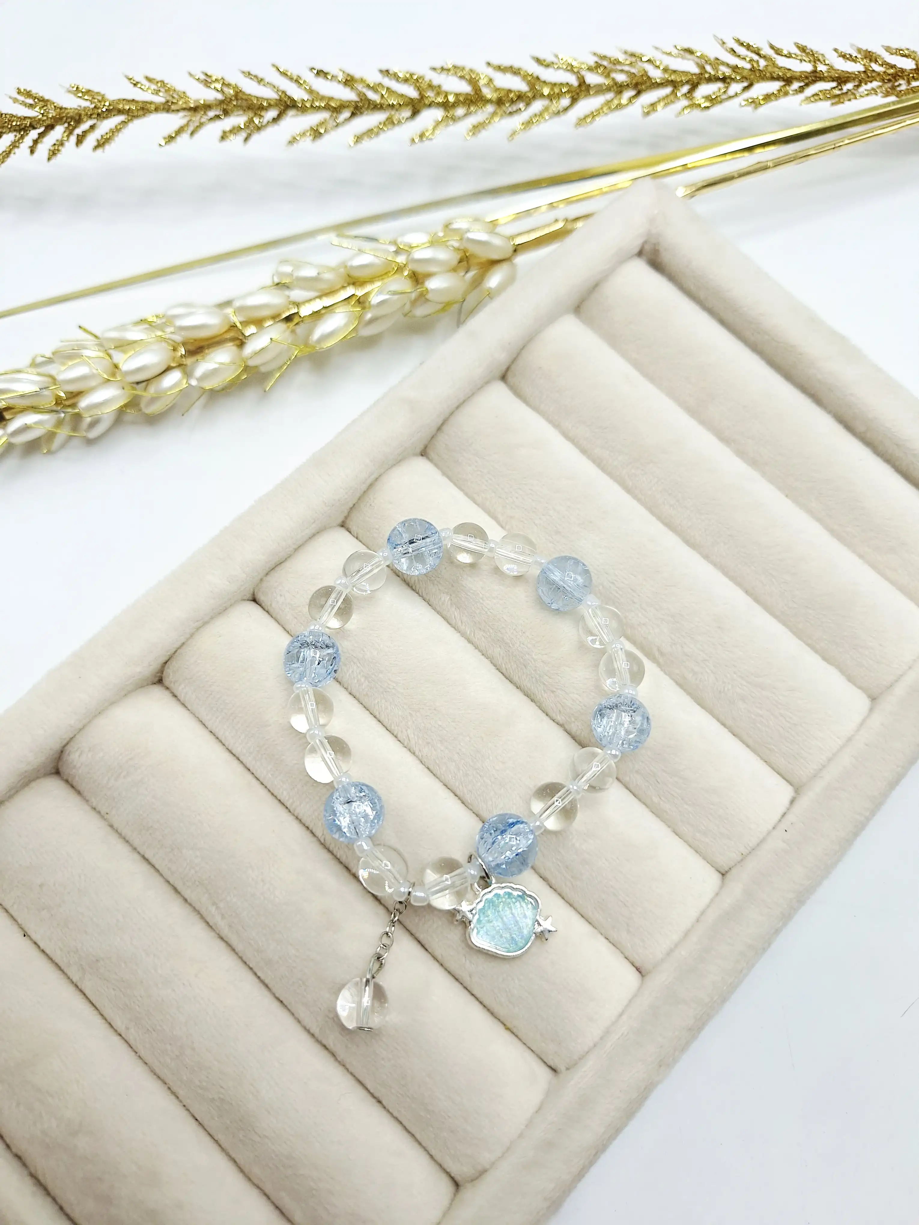 دستبند کشی پینترستی مرواریدی رنگ آبی صدفی
